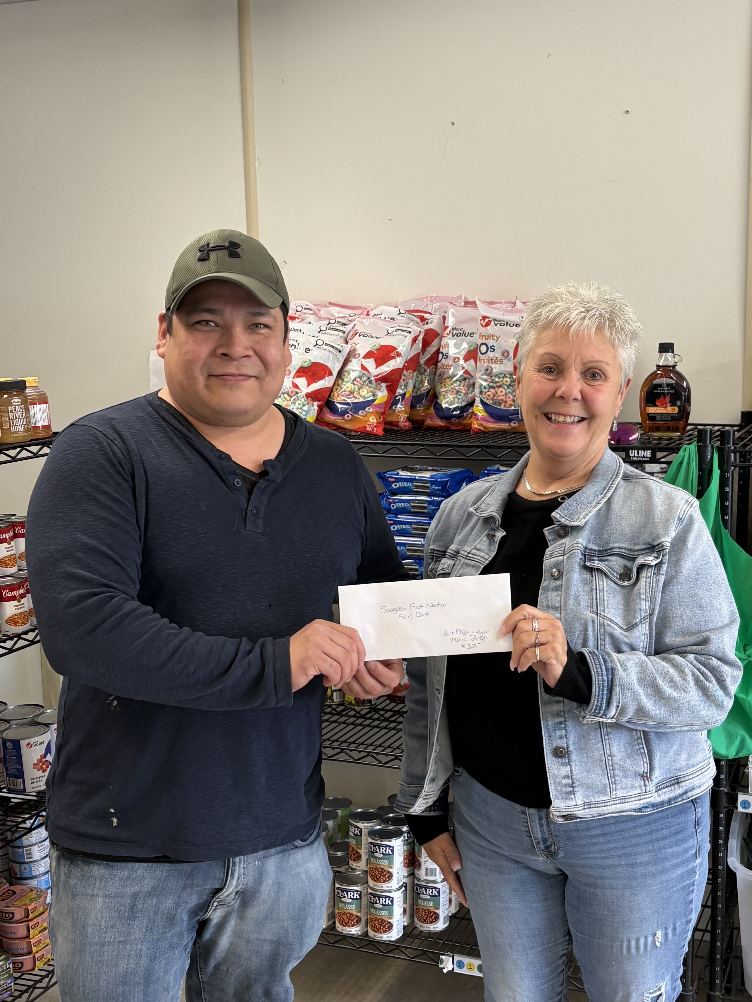 Josh Ritchie, Foodbank Coordinator. and Shelley Hewson, Port Elgin Legion Branch 340